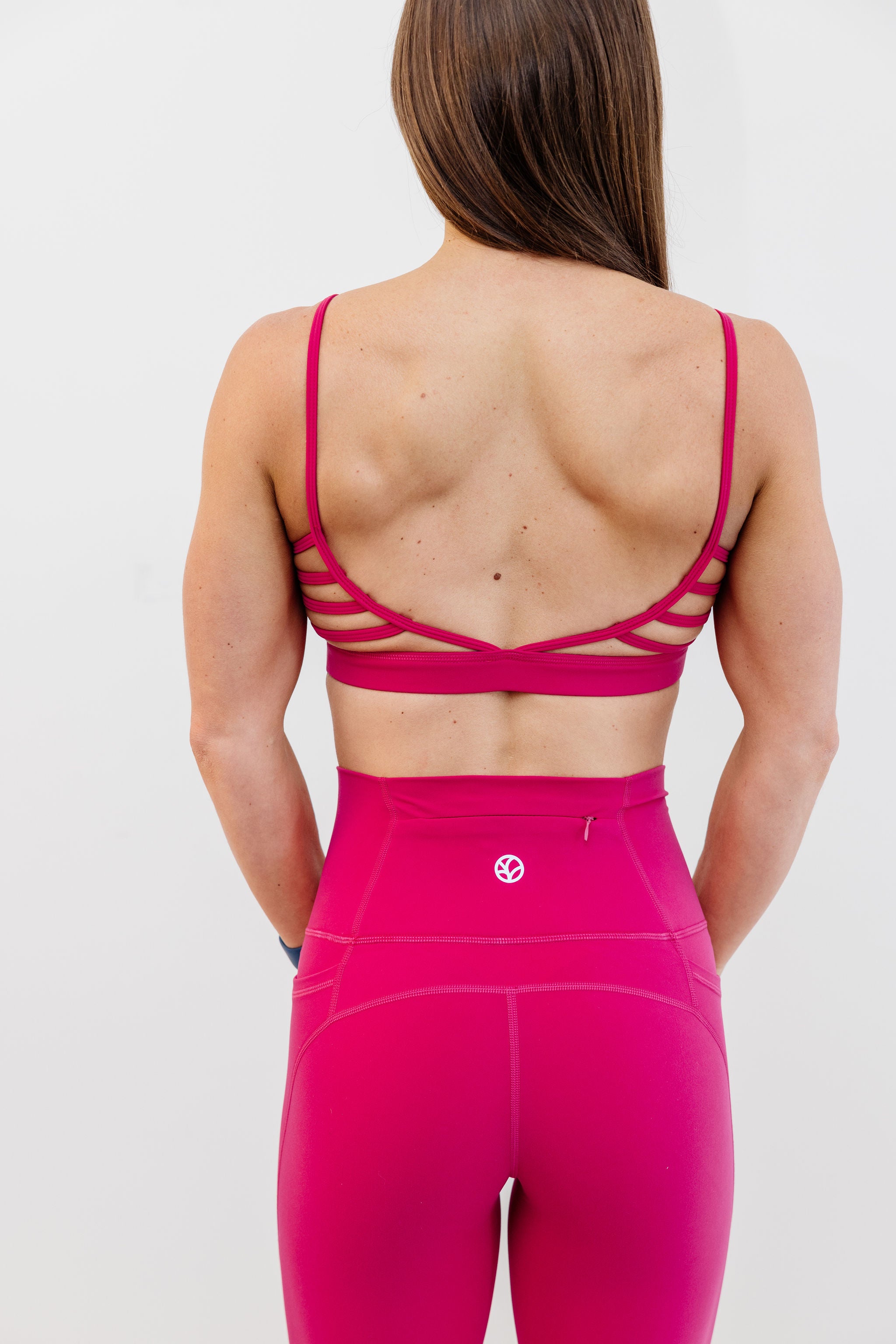 buttery soft tights with pockets, a back zip pocket with seamless front rise in rose red with soft v shape front rise