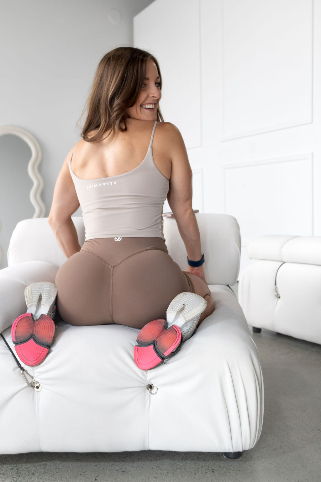 buttery soft singlet with ruched side seams, spaghetti straps and built in shelf bra with removable pads in nude