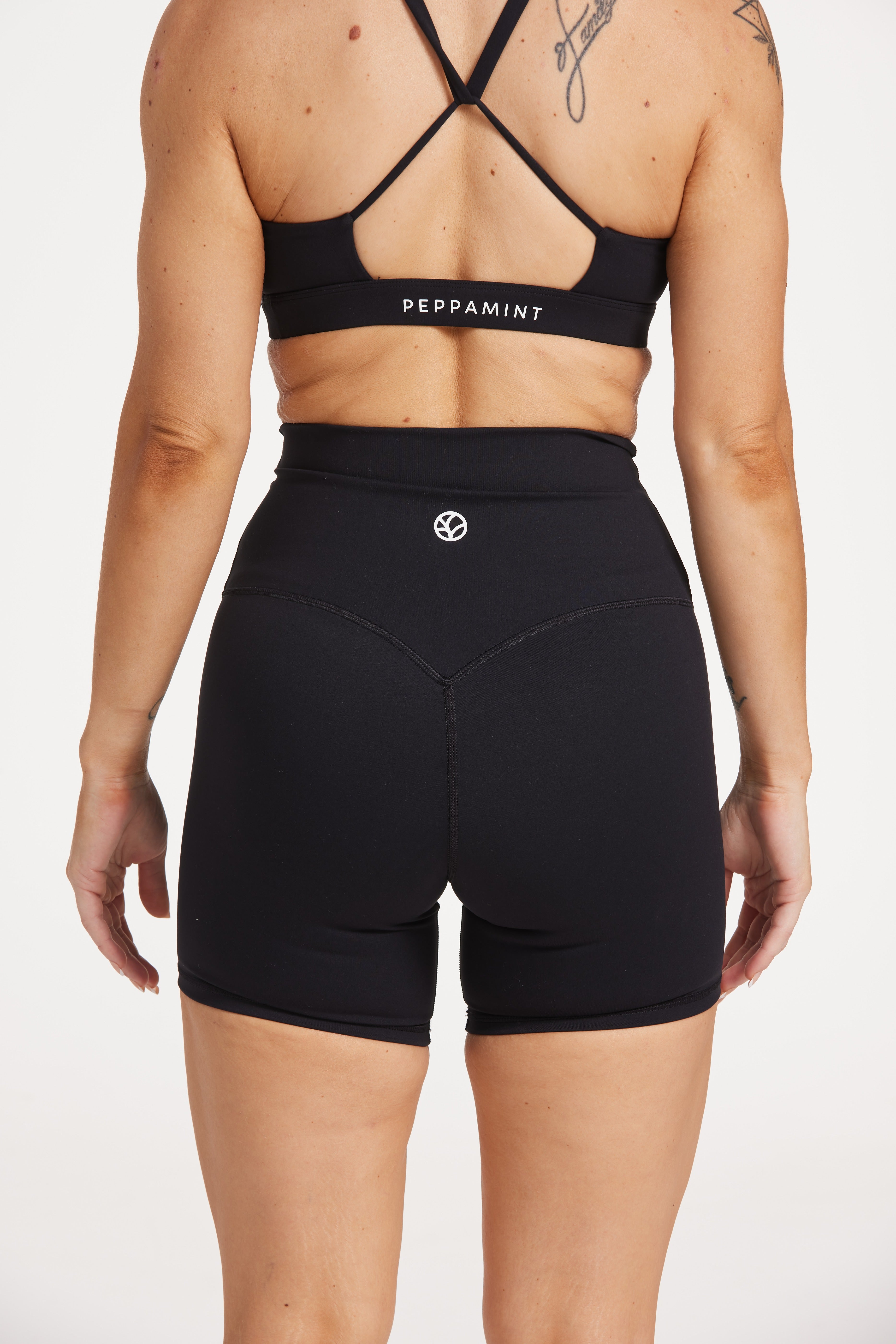 high waisted gym shorts, in buttery soft, supportive fabric with 6 inch inseam and no front rise seam, in black