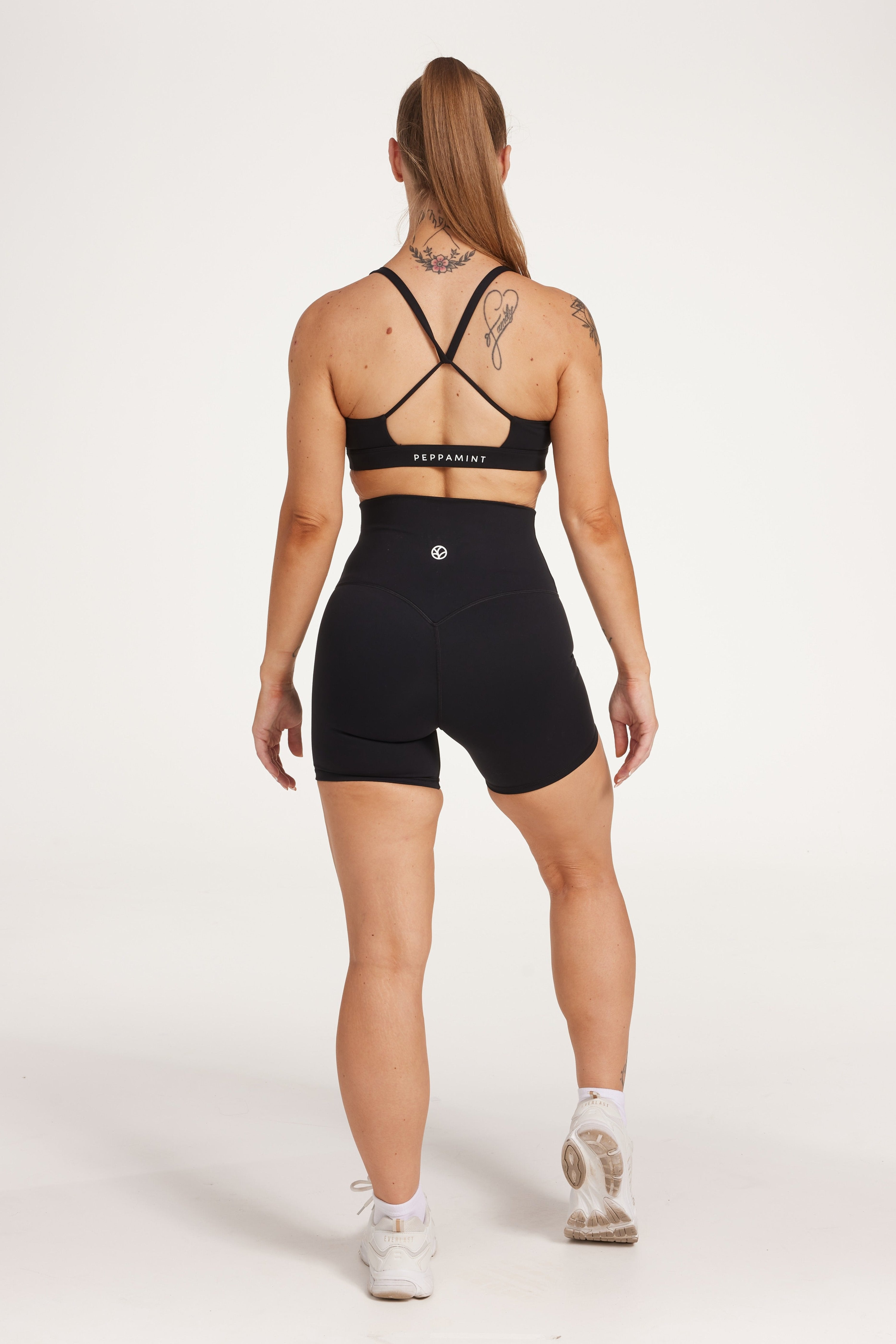 high waisted gym shorts, in buttery soft, supportive fabric with 6 inch inseam and no front rise seam, in black
