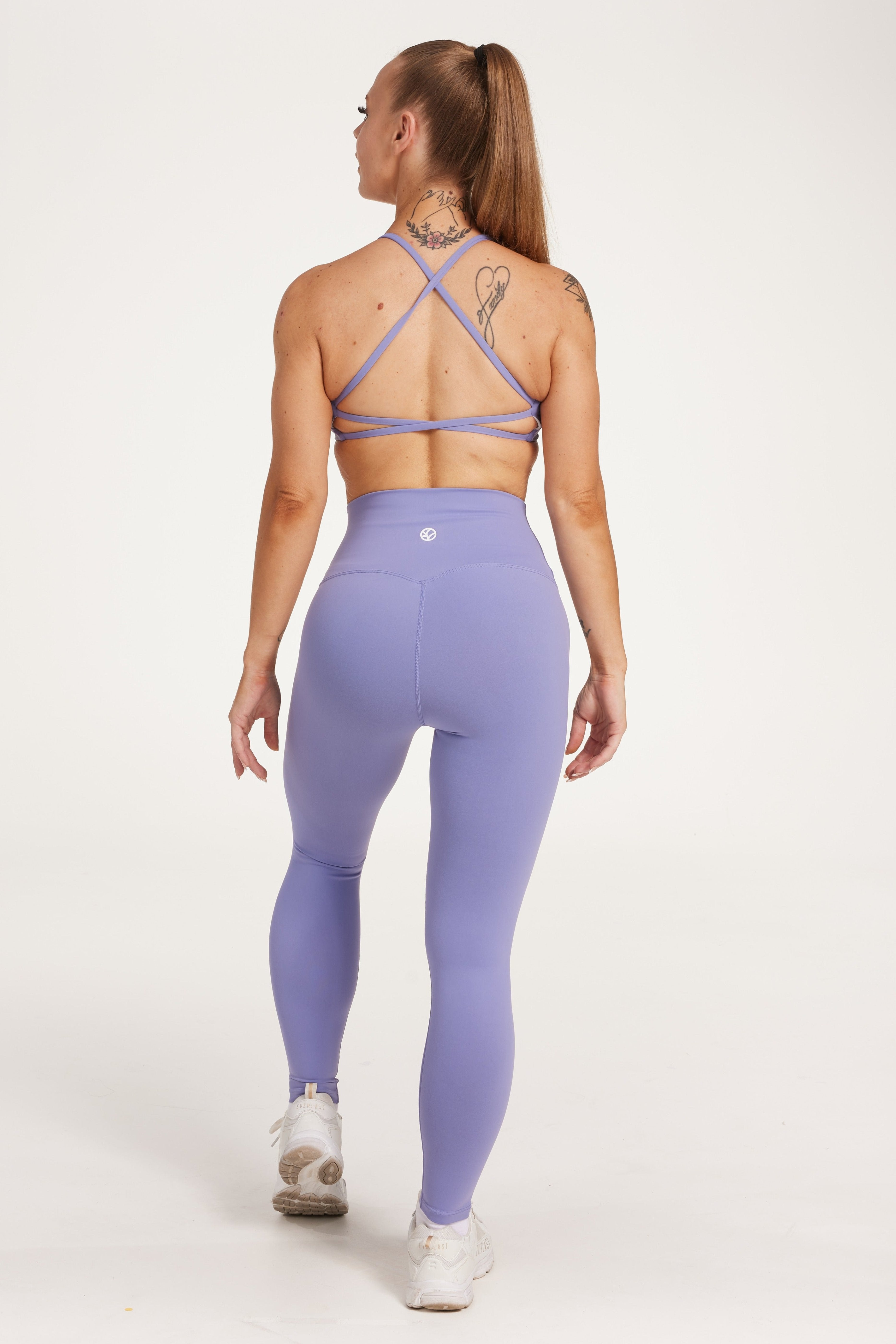 high waisted buttery soft, supportive activewear tights, with no front rise seam in lavender