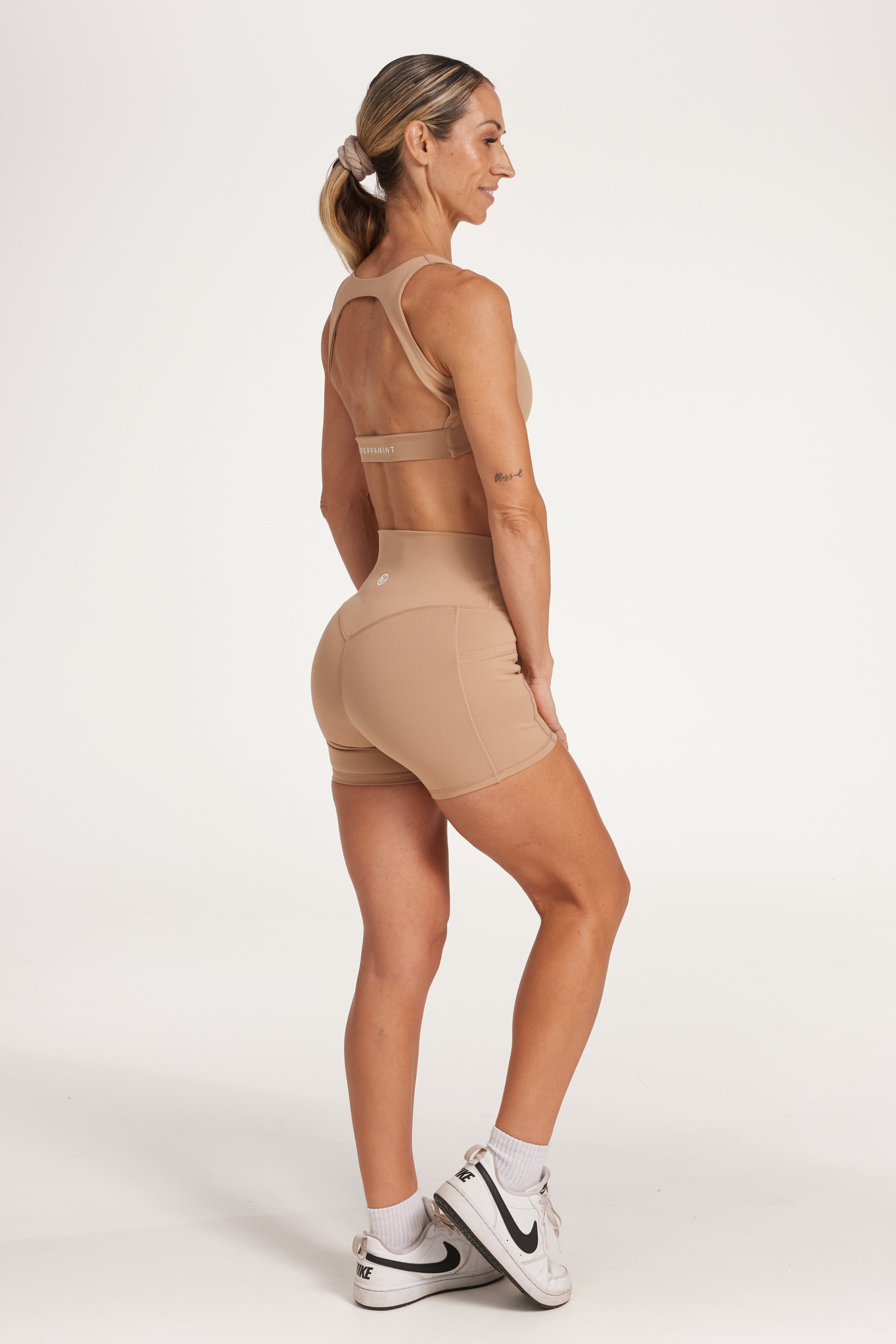 women's scoop activewear bra in buttery soft fabric with stunning arch open back detail and scoop neckline