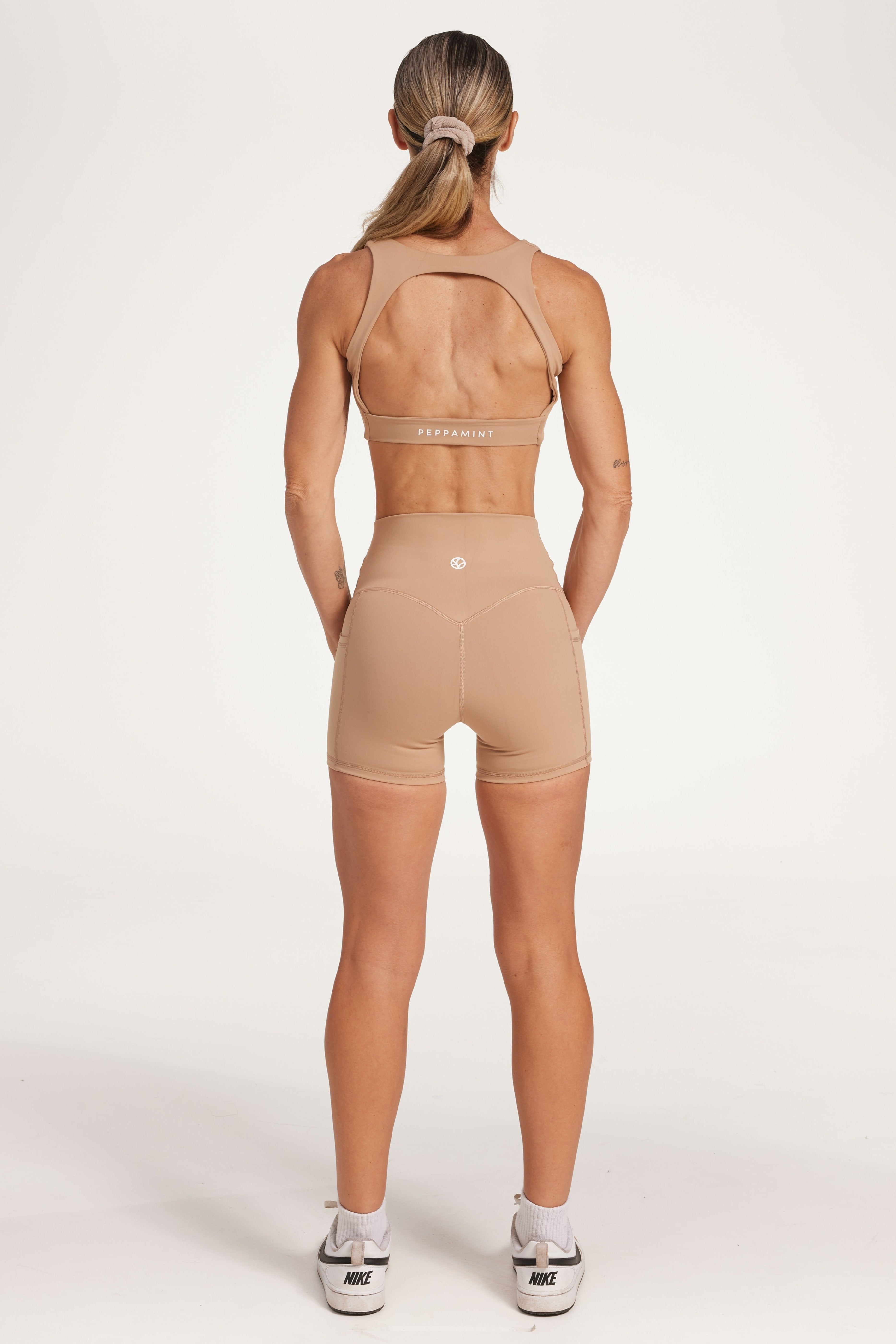 women's scoop activewear bra in buttery soft fabric with stunning arch open back detail and scoop neckline