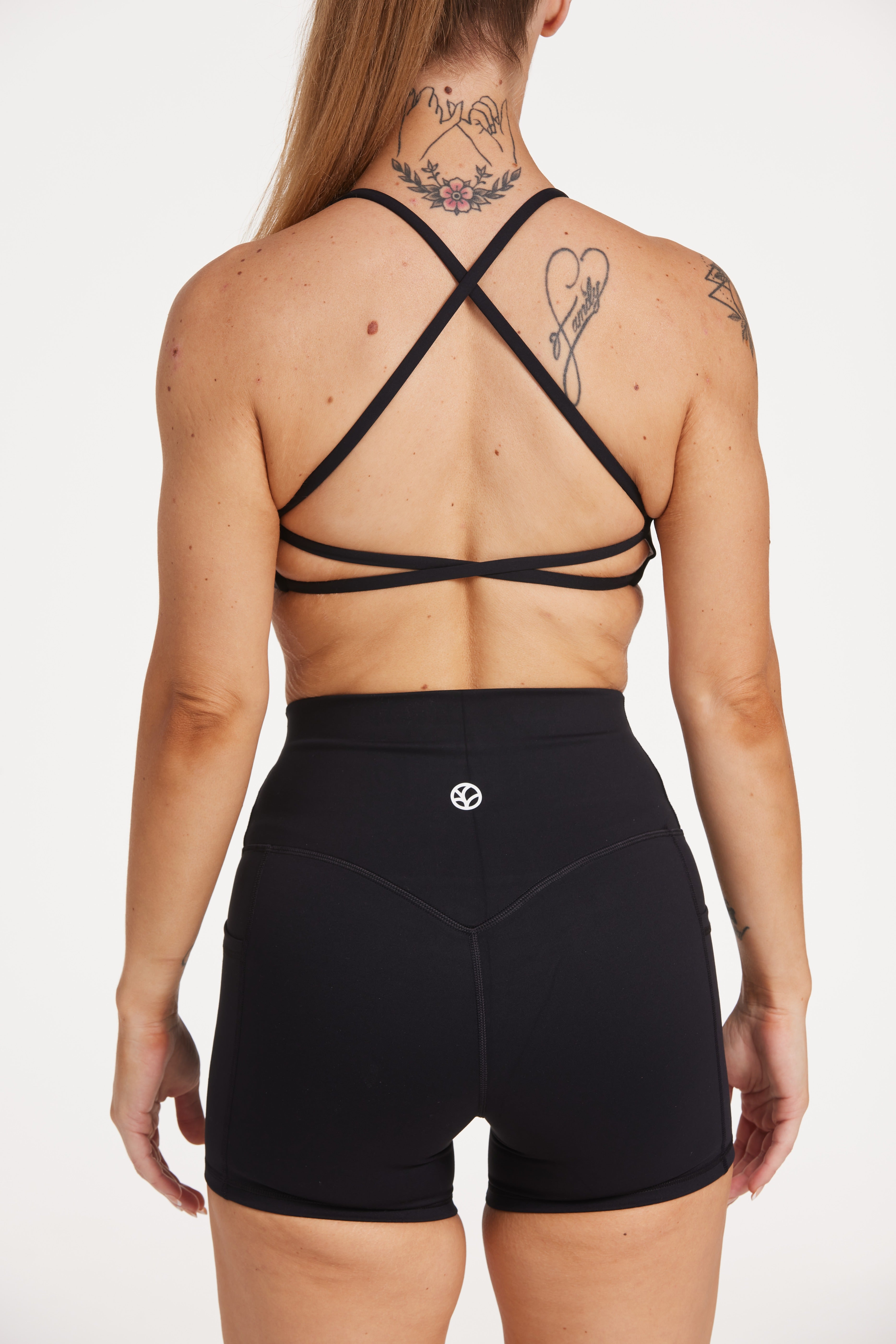 twist front bra with cross over back straps in a buttery soft black fabric