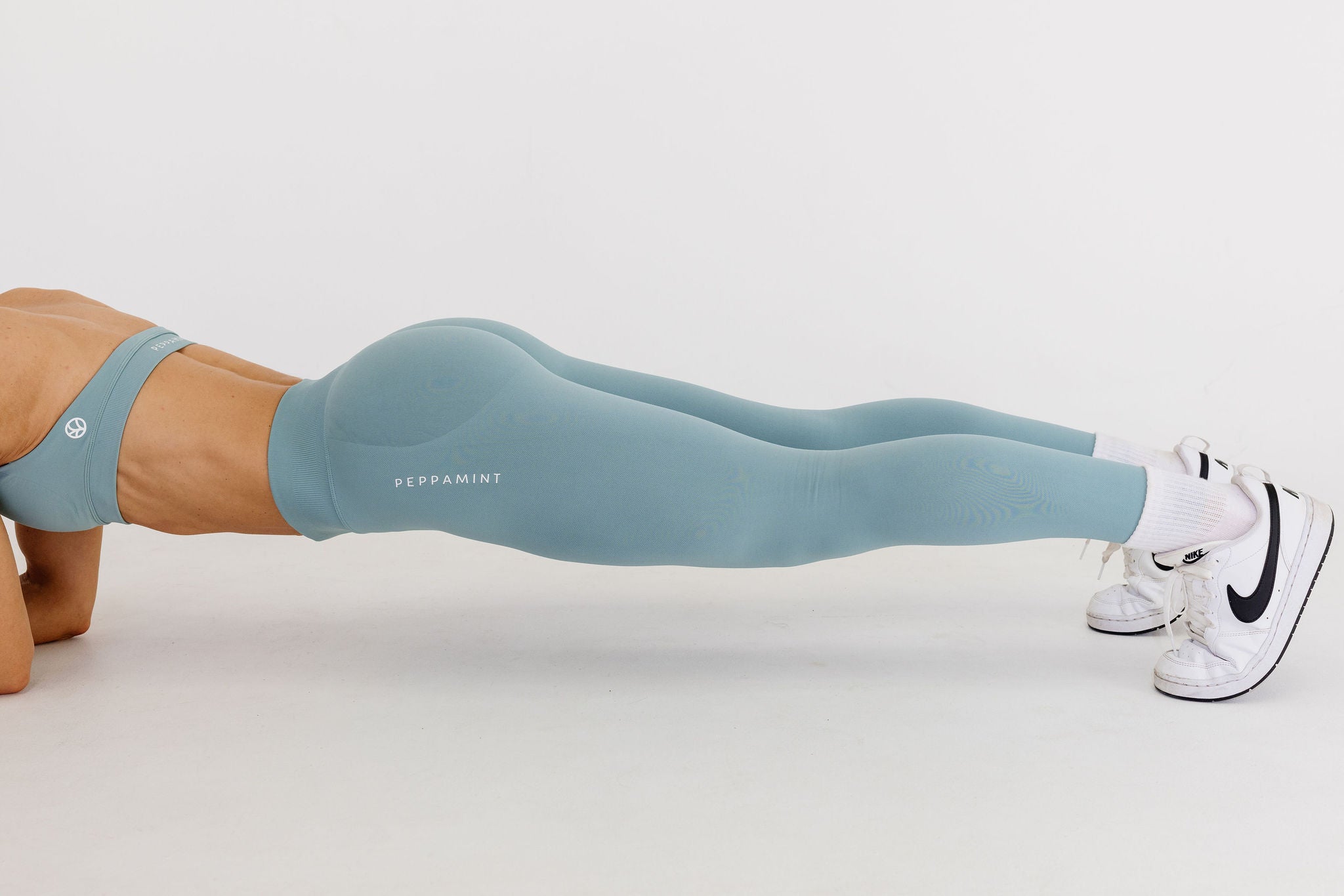 seamless gym tights with booty contouring effect, sweetheart butt seams and thick supportive fabric in sage green