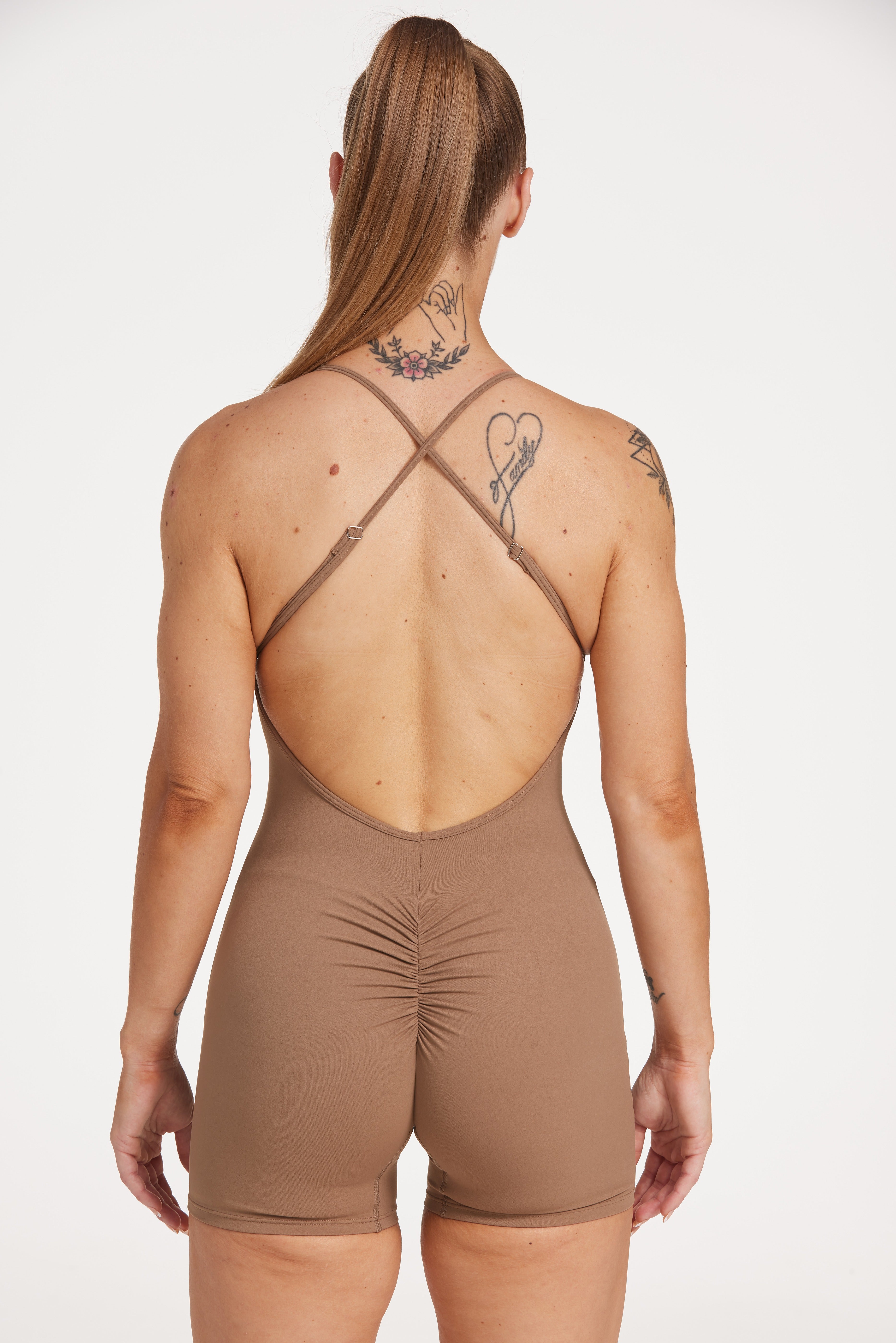 Womens bodysuit with scoop neck design, sleek adjustable cross over back straps scrunch butt effect in a buttery soft breathable fabric