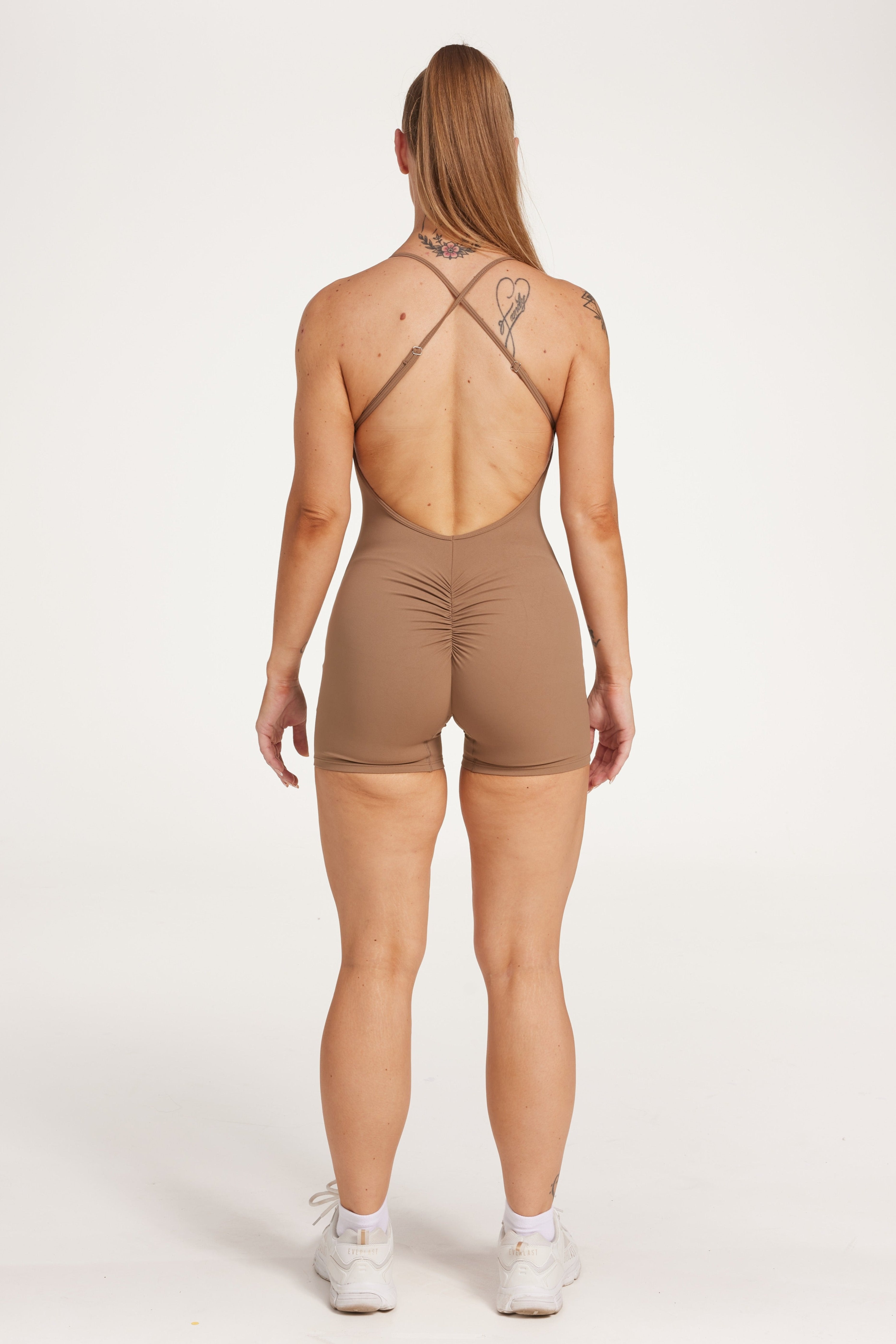 Womens bodysuit with scoop neck design, sleek adjustable cross over back straps scrunch butt effect in a buttery soft breathable fabric