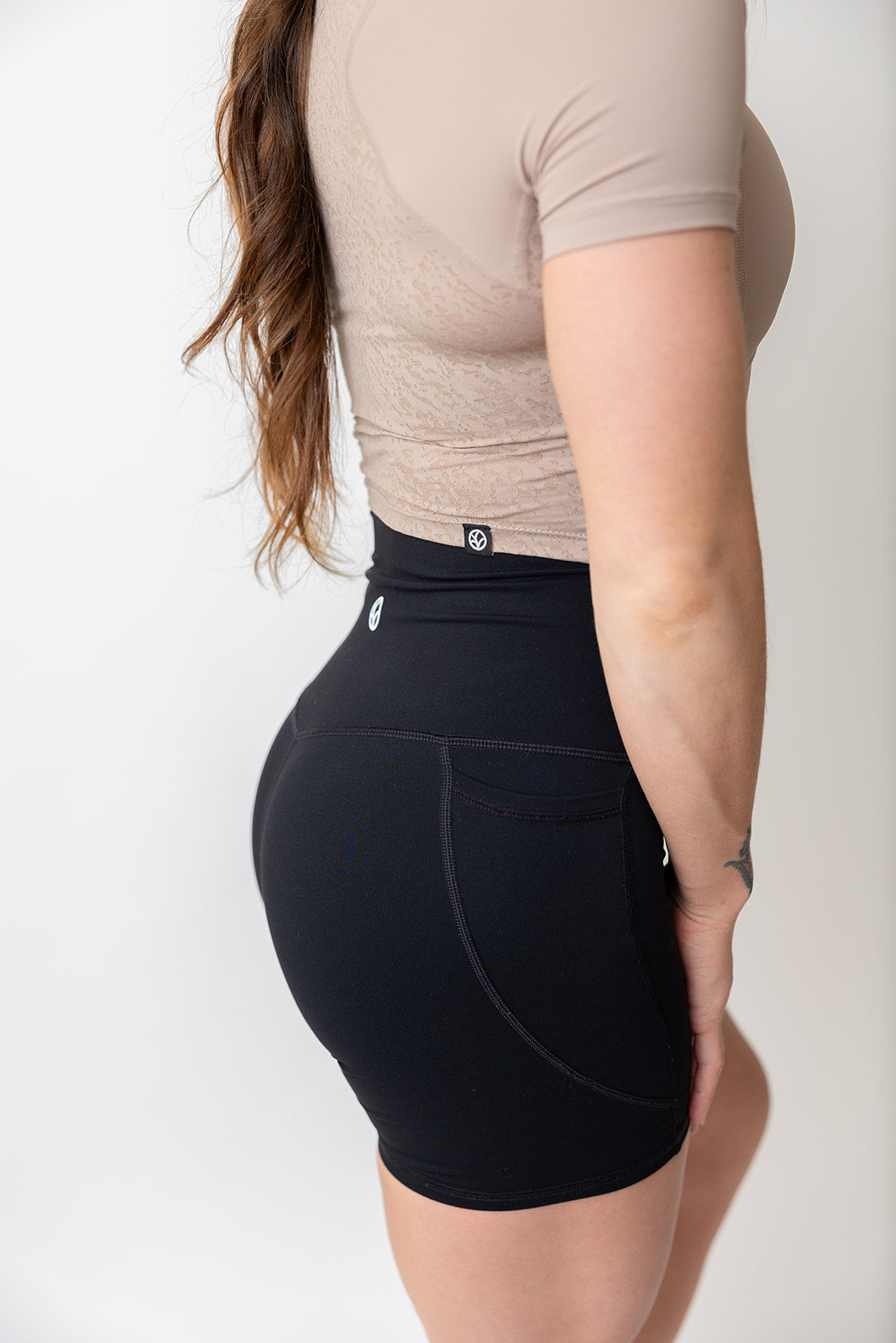 ultra lightweight crop t shirt with short sleeves and lace effect back design with stitched logo tag