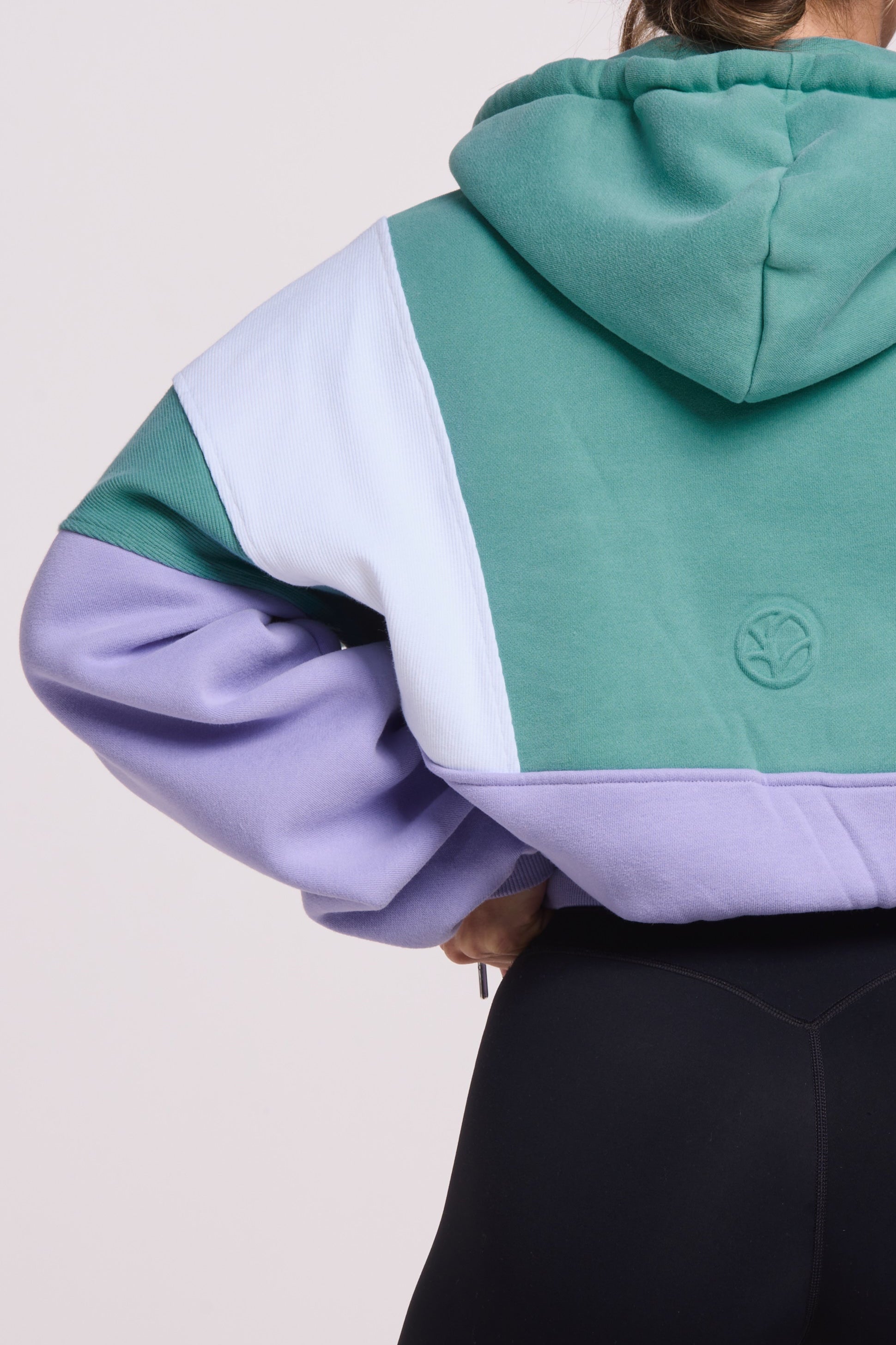 Hip length, full zip hoodie, with ribbed panels, embossed sleeve logo, in a slouchy oversize fit, in green, lavender and white.