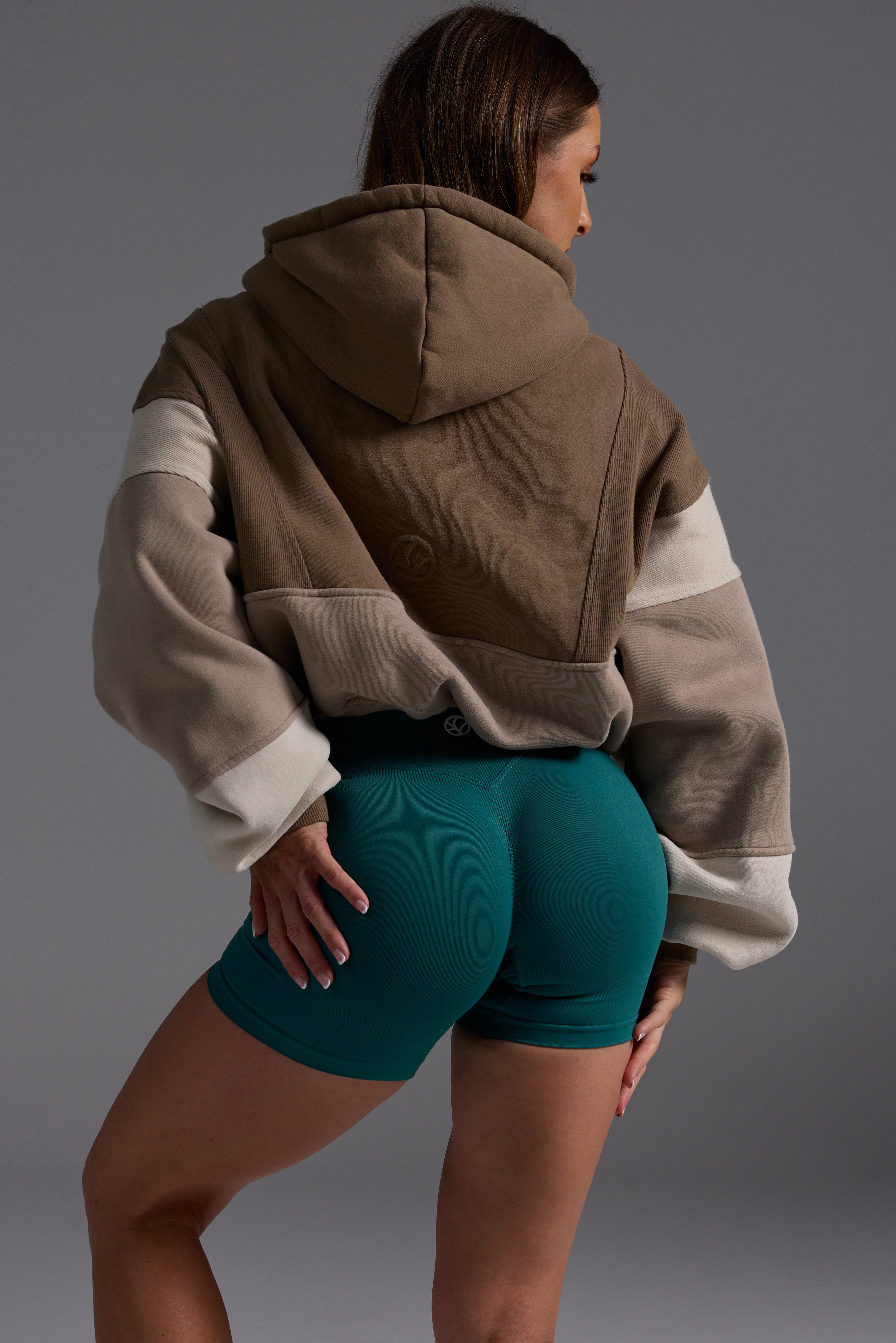 Hip length, full zip hoodie, with ribbed panels, embossed sleeve logo, in a slouchy oversize fit, with 2 convenient zip pockets, in mocha, stone and beige