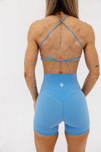 Load image into Gallery viewer, buttery soft sports bra with spaghetti straps and cross back strap design in baby blue
