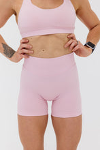 Load image into Gallery viewer, Seamless shorts with booty contouring panels, a thick supportive waistband in peony pink
