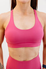 Load image into Gallery viewer, medium support buttery soft sports bra with cross over back straps and u neck front design in raspberry jam pink
