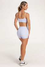 Load image into Gallery viewer, Womens scoops neck sports bra complete with white trim, elasticated hem, and supportive thick backstraps in periwinkle blue
