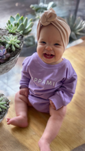 Load image into Gallery viewer, Oversize/Slouch fit baby bodysuit in lavender made of french terry cotton fabric, with white branded Peppamint logo centre chest
