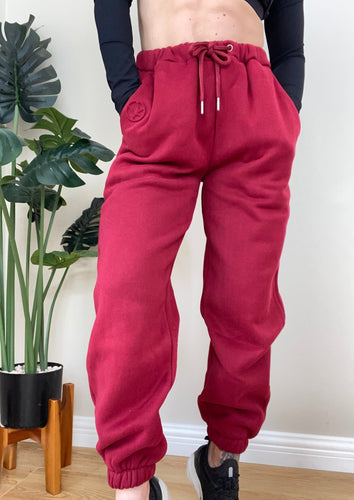 Red fleece lined lounge joggers with drawstring and oversize slouchy fit