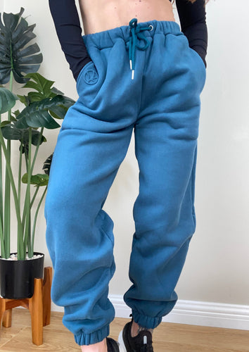 Blue fleece lined lounge joggers with drawstring and oversize slouchy fit