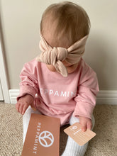 Load image into Gallery viewer, Oversize/Slouch fit baby bodysuit in pink made of french terry cotton fabric, with white branded Peppamint logo centre chest
