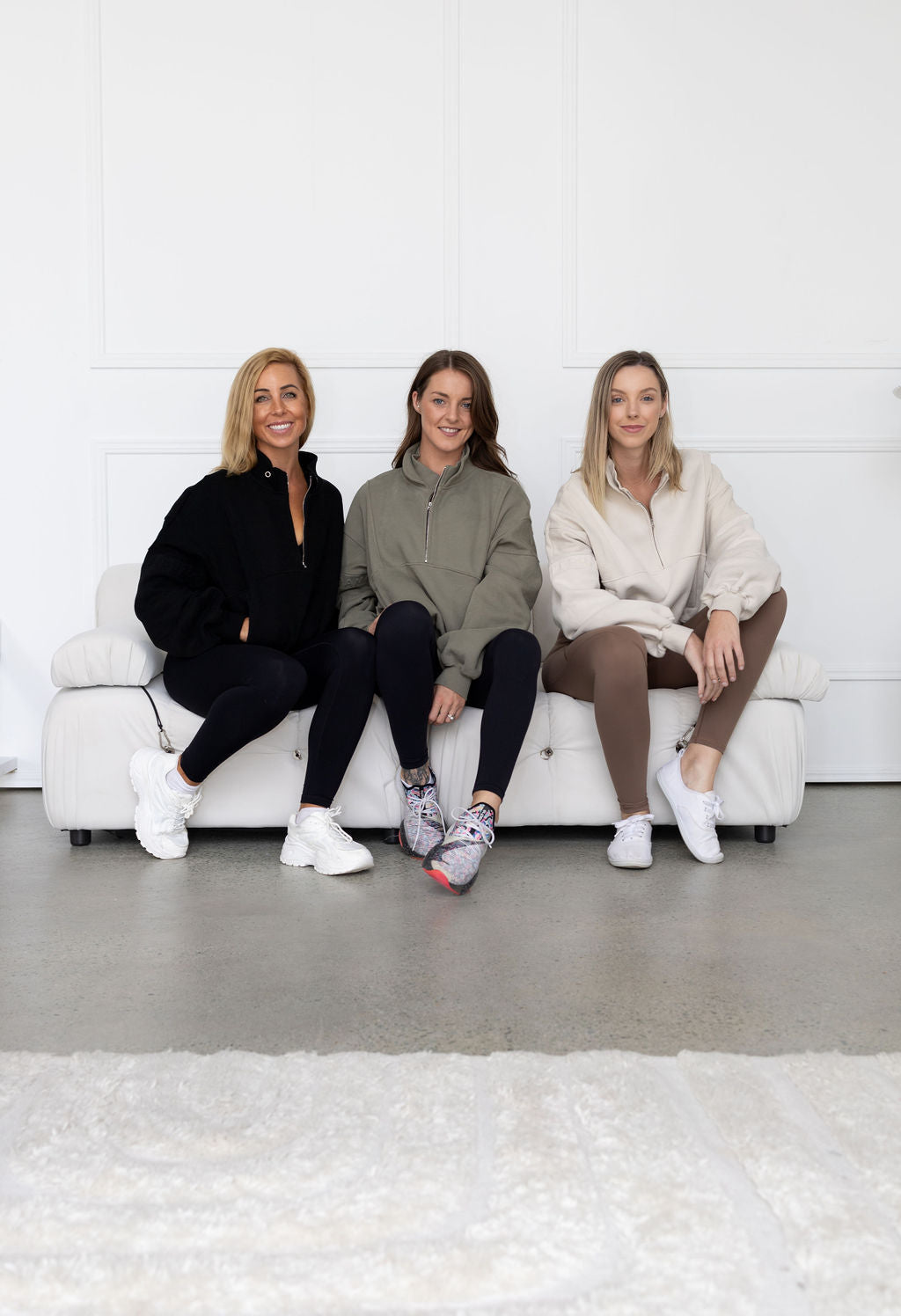 Fleece lined crop jacket in olive green with half zip, and ribbed panels, and side pockets.