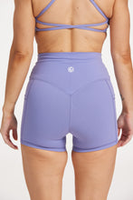 Load image into Gallery viewer, womens high waisted pocket shorts with 4&quot; inseam, no front rise seam, 2 side pockets for convenient storage in a buttery soft lavender fabric
