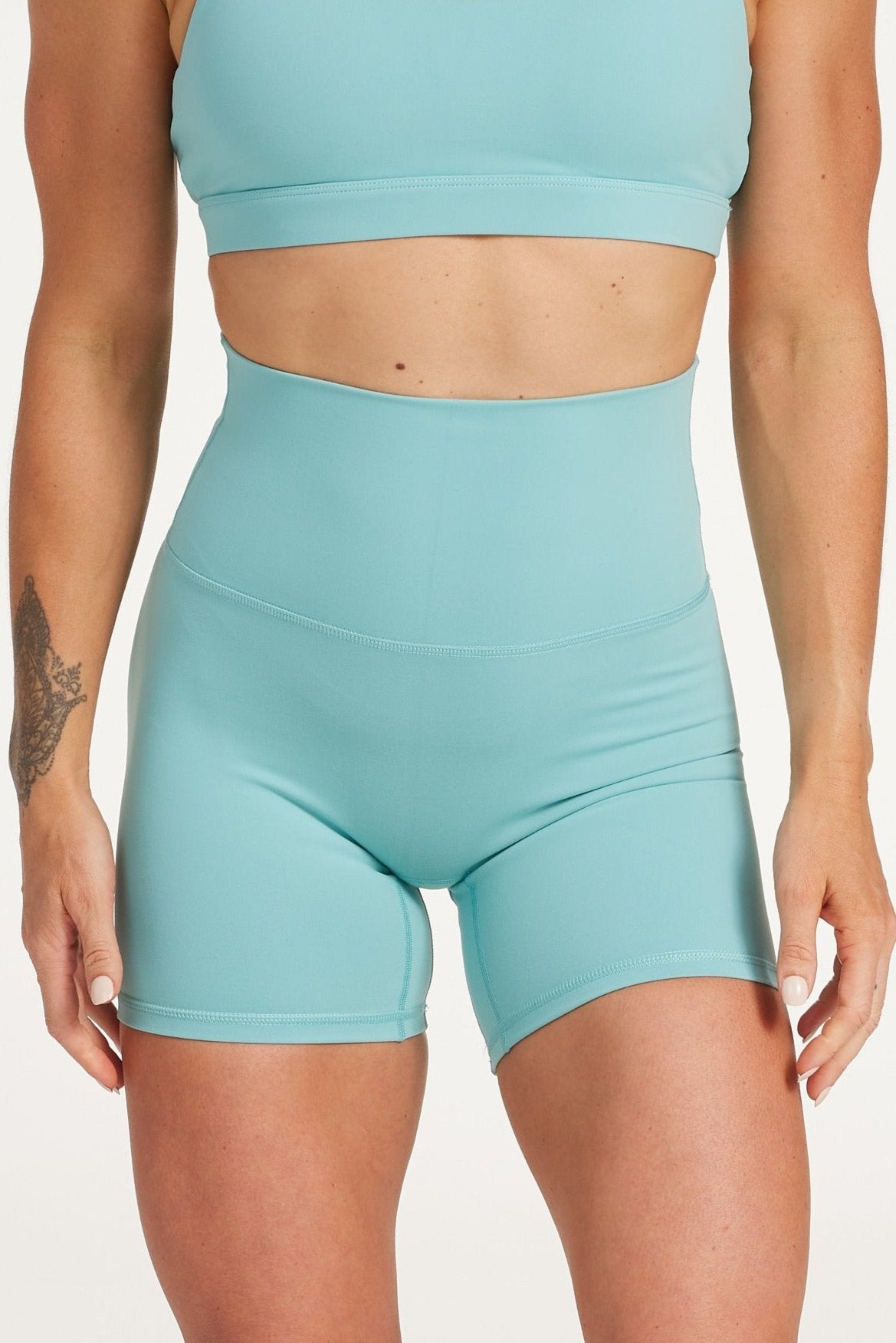 high waisted gym shorts, in buttery soft, supportive fabric with 6 inch inseam and no front rise seam, in lagoon green