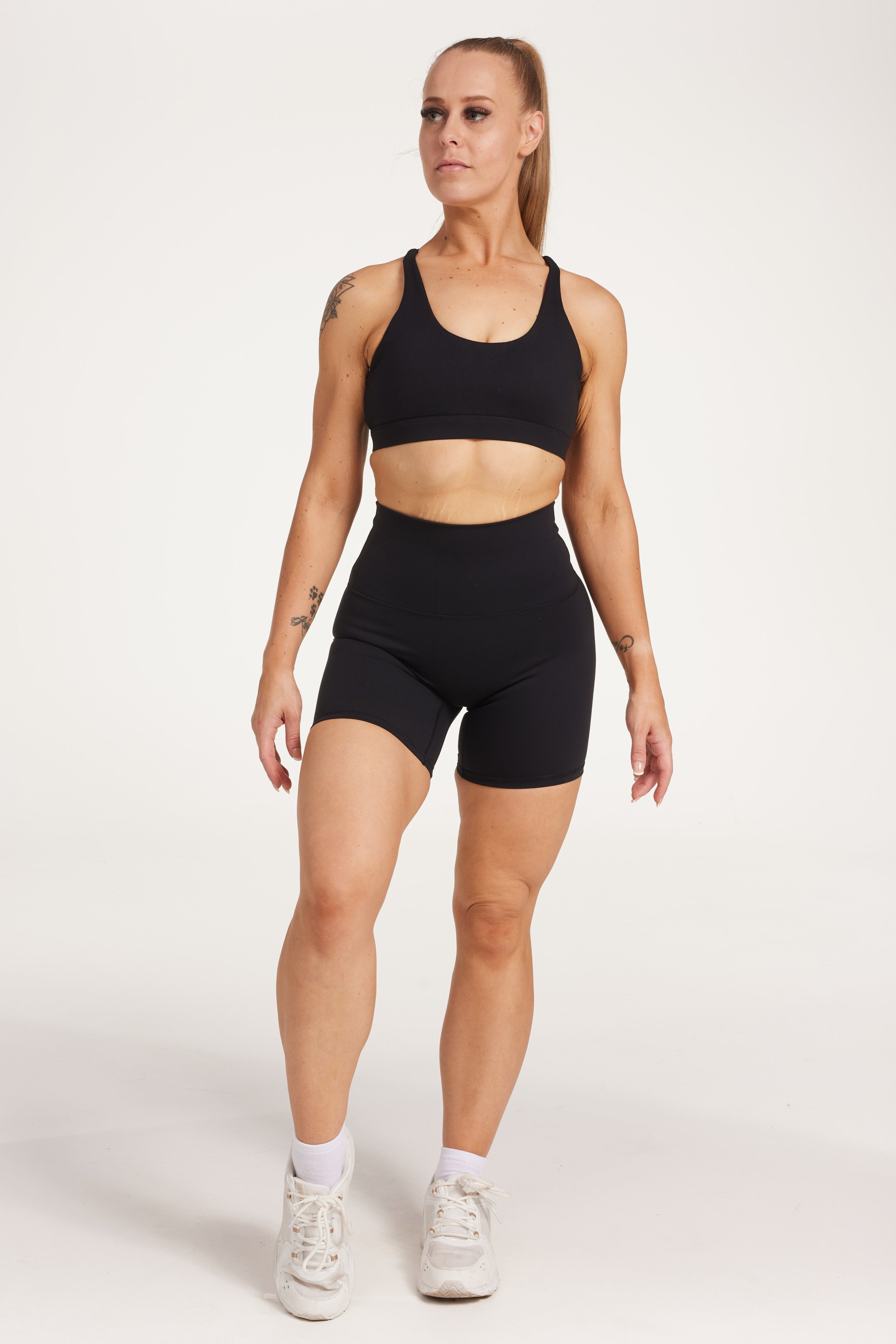 high waisted gym shorts, in buttery soft, supportive fabric with 6 inch inseam and no front rise seam, in black