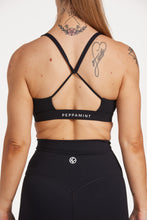 Load image into Gallery viewer, medium support buttery soft sports bra with cross over back straps and u neck front design in black
