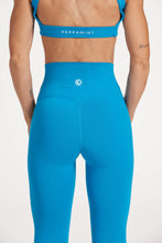 Load image into Gallery viewer, high waisted buttery soft, supportive activewear tights, with no front rise seam in blue coral
