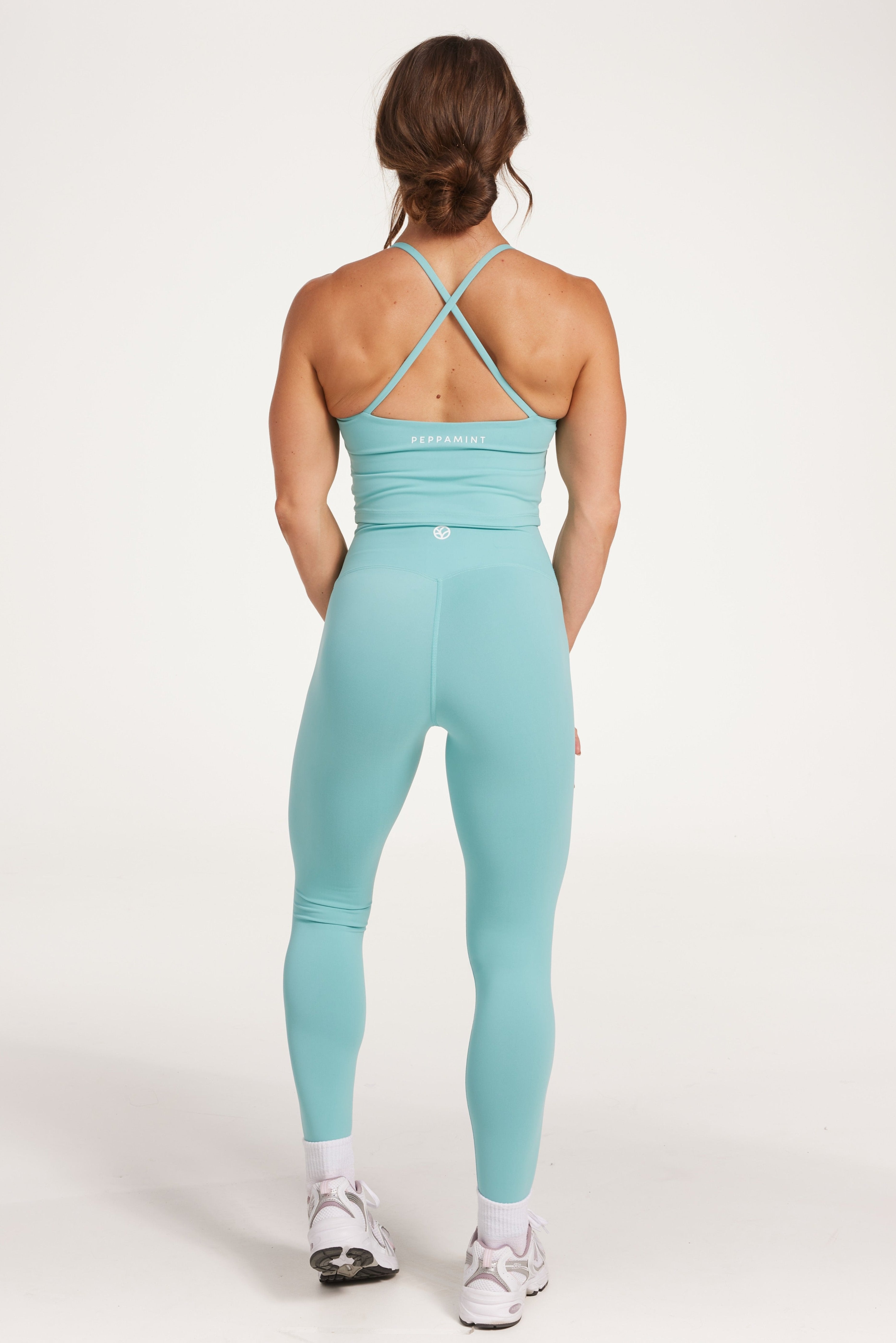 high waisted buttery soft, supportive activewear tights in lagoon green colour