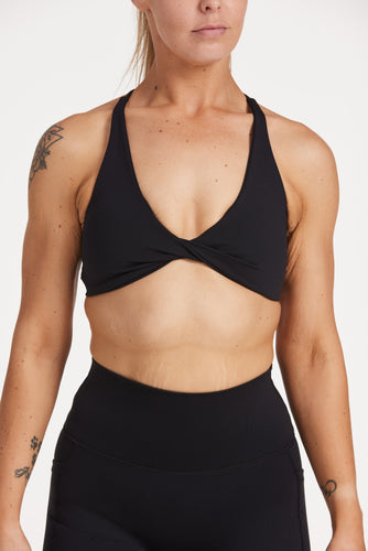 twist front bra with cross over back straps in a buttery soft black fabric