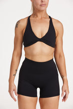 Load image into Gallery viewer, high waisted 4&quot; inseam activewear shorts with no front rise seam, in a buttery soft, supportive fabric with twist front bra and cross over back straps
