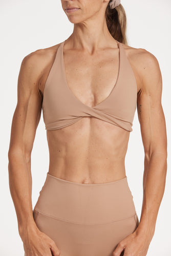 twist front bra with cross over back straps in a buttery soft fabric in a light taupe colour