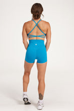 Load image into Gallery viewer, twist front bra with cross over back straps in a buttery soft blue coral fabric
