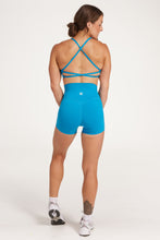 Load image into Gallery viewer, twist front bra with cross over back straps in a buttery soft blue coral fabric
