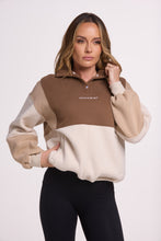 Load image into Gallery viewer, 1/4 button up fleece jumper with earthy colour panels in chocolate and beige, with feature panels ribbed stretchy fabric inserts, and two convenient zip pockets.
