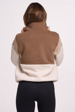 Load image into Gallery viewer, 1/4 button up fleece jumper with earthy colour panels in chocolate and beige, with feature panels ribbed stretchy fabric inserts, and two convenient zip pockets.
