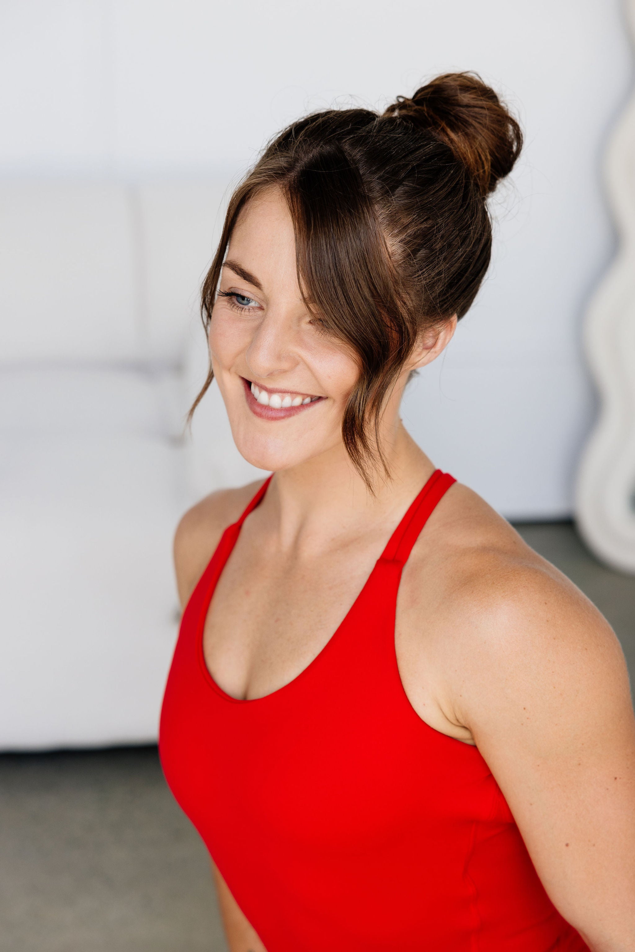 chilli red bodysuit with cross back straps, low back and sweetheart bum seams