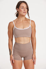 Load image into Gallery viewer, Womens scoops neck sports bra complete with white trim, elasticated hem, and supportive thick backstraps in hazelnut
