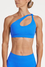 Load image into Gallery viewer, Cross over strap activewear bra in seamless fabric with adjustable back straps, and ribbed supportive underbust band in royal blue
