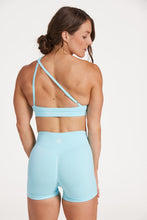 Load image into Gallery viewer, Seamless shorts with booty contouring panels, a thick supportive waistband in ice blue
