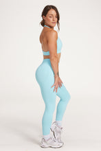 Load image into Gallery viewer, seamless gym tights with booty contouring effect, sweetheart butt seams and thick supportive fabric in ice blue
