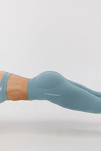 Load image into Gallery viewer, seamless gym tights with booty contouring effect, sweetheart butt seams and thick supportive fabric in sage green
