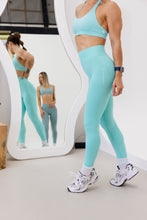 Load image into Gallery viewer, seamless gym tights with booty contouring effect, sweetheart butt seams and thick supportive fabric in mint
