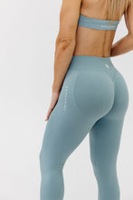 Load image into Gallery viewer, seamless gym tights with booty contouring effect, sweetheart butt seams and thick supportive fabric in sage green
