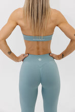 Load image into Gallery viewer, seamless gym tights with booty contouring effect, sweetheart butt seams and thick supportive fabric in sage green
