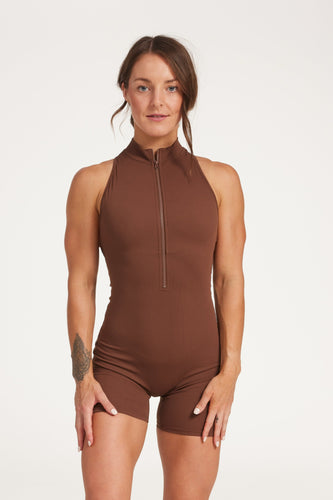 High neck bodysuit with half zipper, scrunch bum detailing, in short length made from a buttery soft flexible fabric in chocolate plum