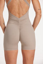 Load image into Gallery viewer, High neck bodysuit with half zipper, scrunch bum detailing, in short length made from a buttery soft flexible fabric in pumice stone
