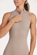 Load image into Gallery viewer, High neck bodysuit with half zipper, scrunch bum detailing, in short length made from a buttery soft flexible fabric in pumice stone
