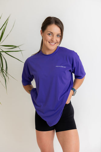 buttery soft oversize t shirt in purple blue colour with white left chest peppamint logo