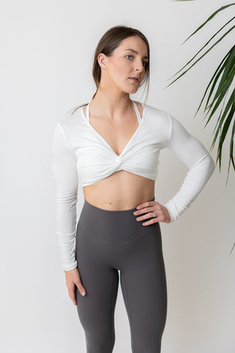 cotton soft twist front crop top with long sleeves and stitched logo tag